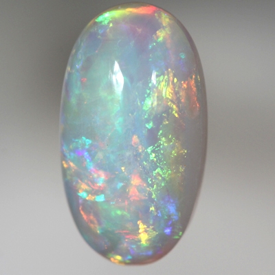 SOLID CRYSTAL OPAL Sparkles of bright orange to green to purple